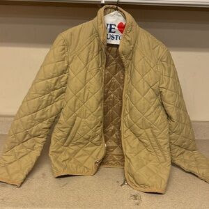 Woman’s Ralph Lauren puffer style jack tan color.